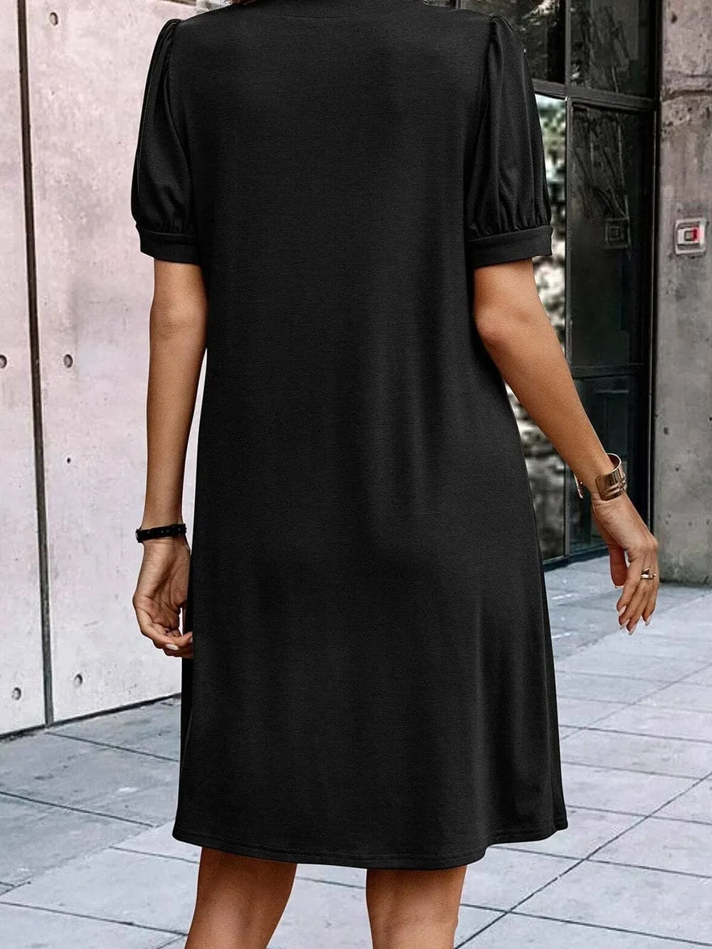 Black Pleated Shift Dress with Notched Neck and Puff Sleeves