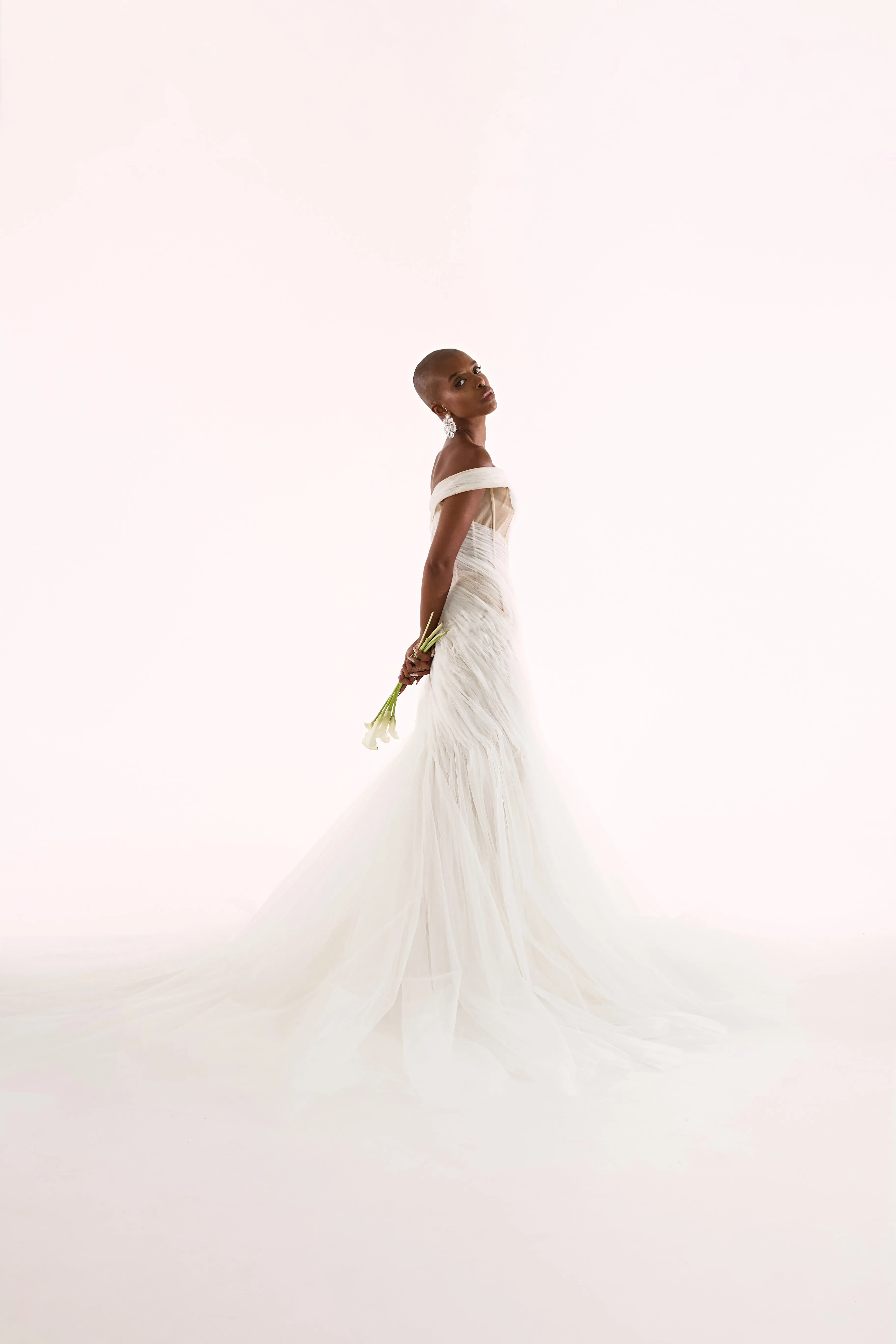 Captivating One-Shoulder Tulle Wedding Dress with Romantic Draped Waves